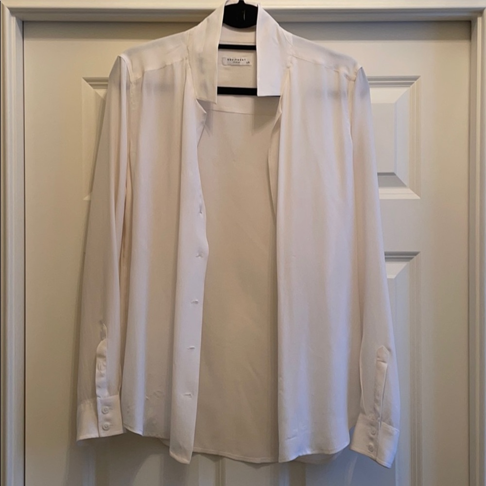 White silk blouse by equipment